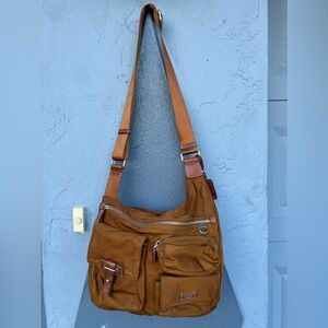 TUMI  bags,brown colors